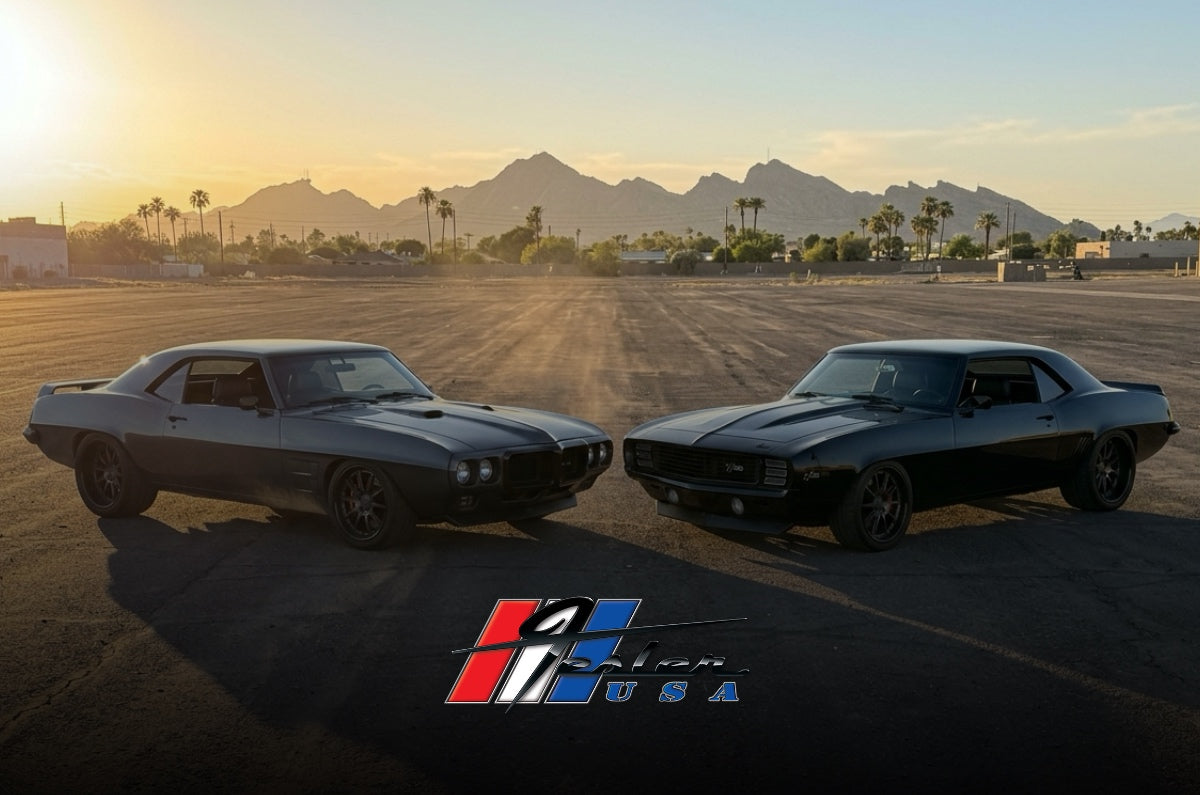 Pro-touring Pontiac Firebird and Chevrolet Camaro nose to nose in Phoenix, Arizona
