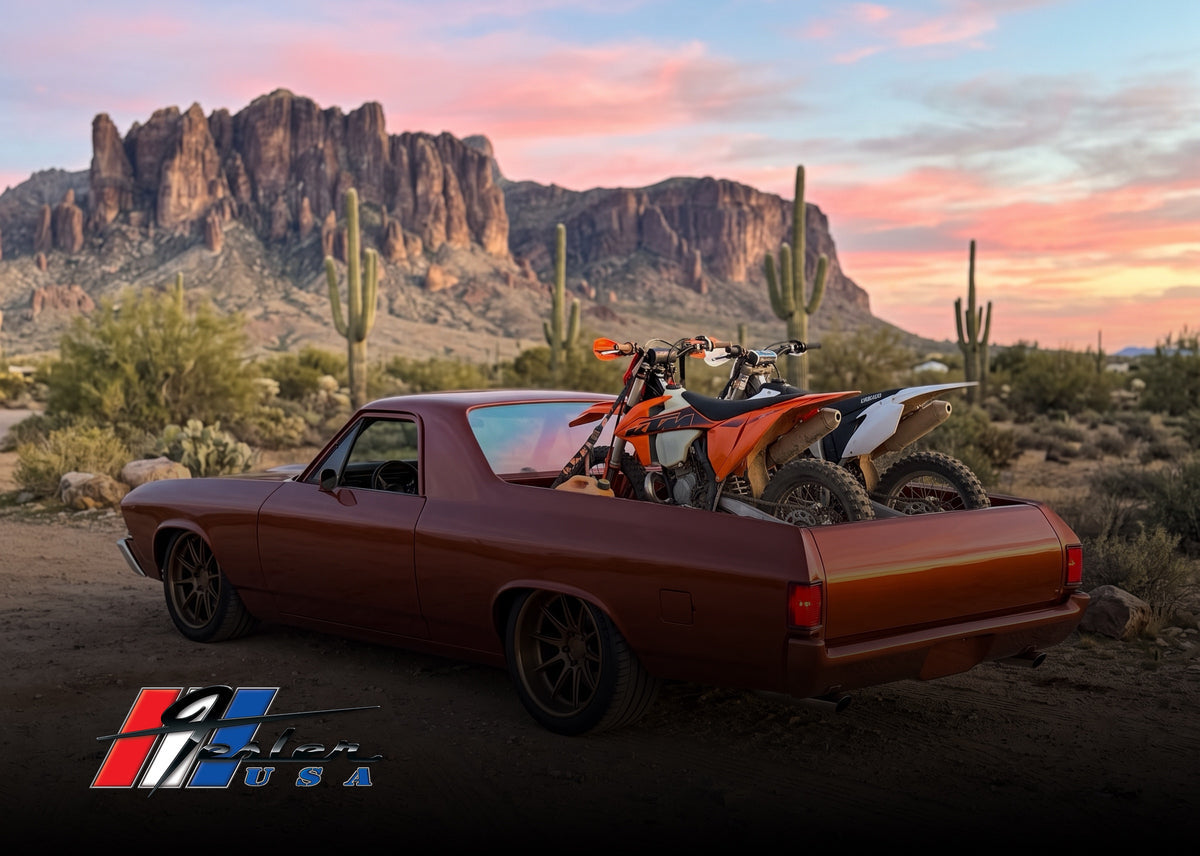 Chevrolet El Camino with Fesler flush-mount glass and dirt bikes in the bed