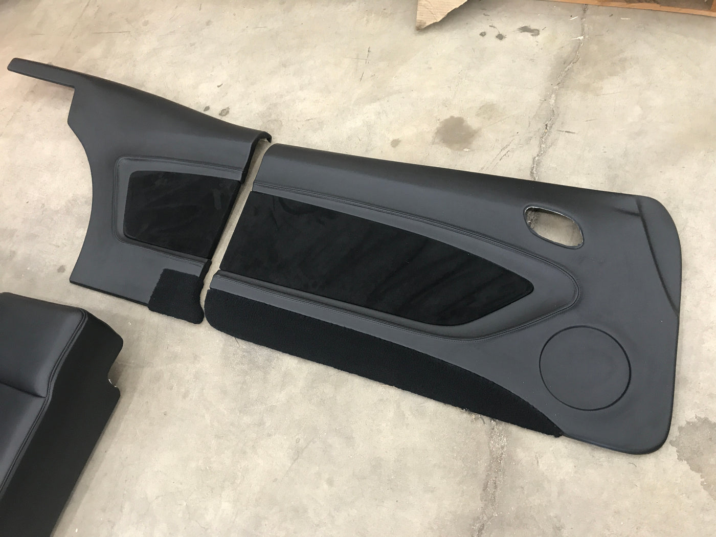 Close view of Fesler molded fiberglass door panel surface ready for upholstery